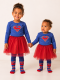 Two children standing together in the Supergirl™ Unstoppable range